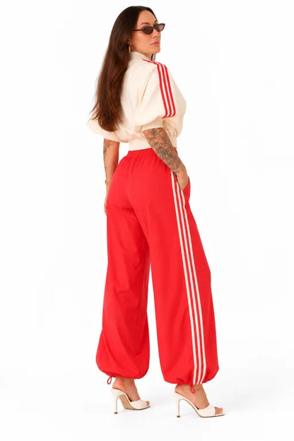 LUMINA women's red and cream two-piece tracksuit – three-quarter back view